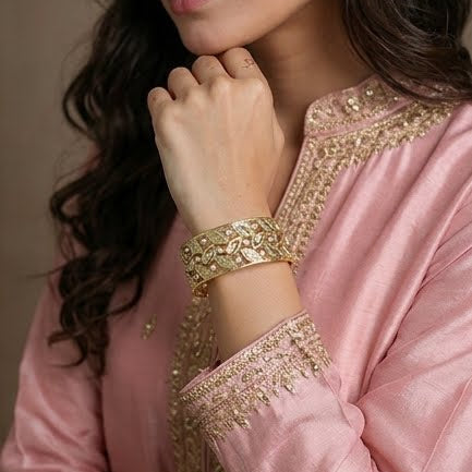 Elegant Gold-Tone Crystal Leaf Vine Bangle