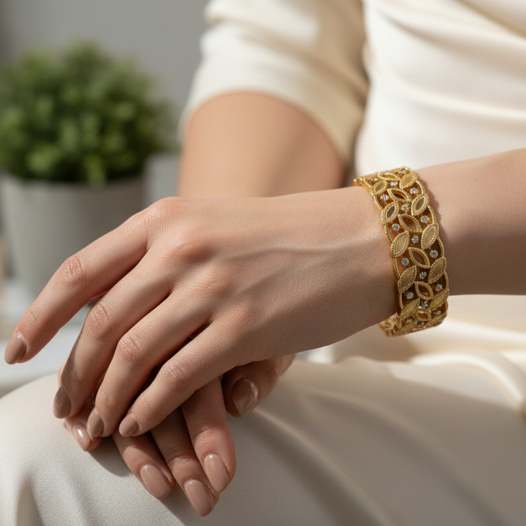 Elegant Gold-Tone Crystal Leaf Vine Bangle