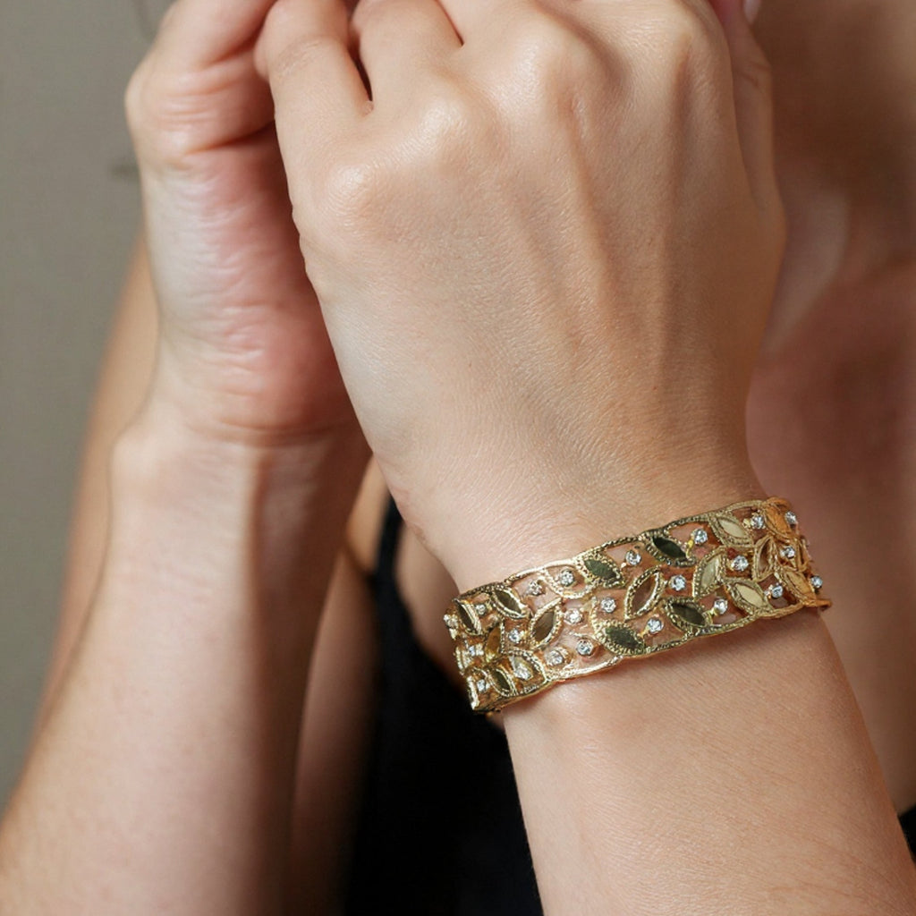 Elegant Gold-Tone Crystal Leaf Vine Bangle