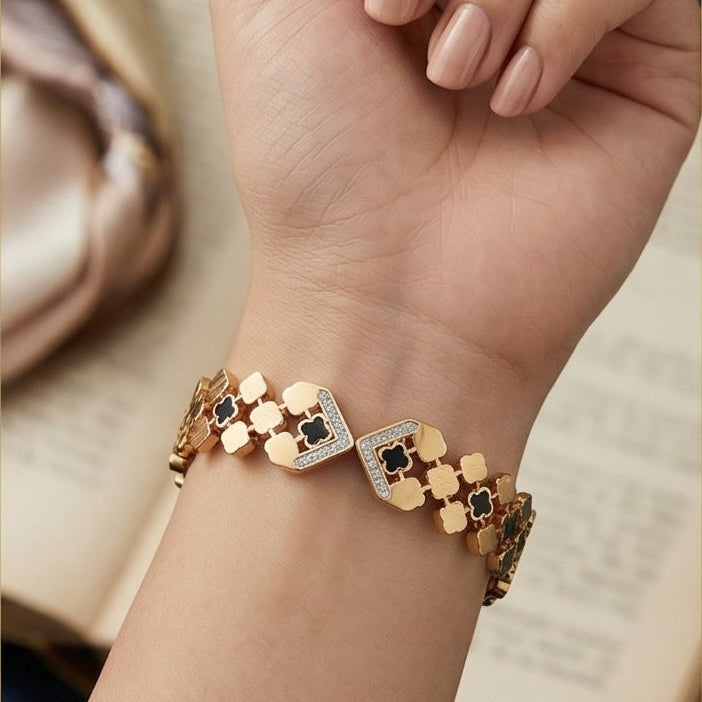 Luxurious Gold Crystal & Black Quatrefoil Statement Bangle