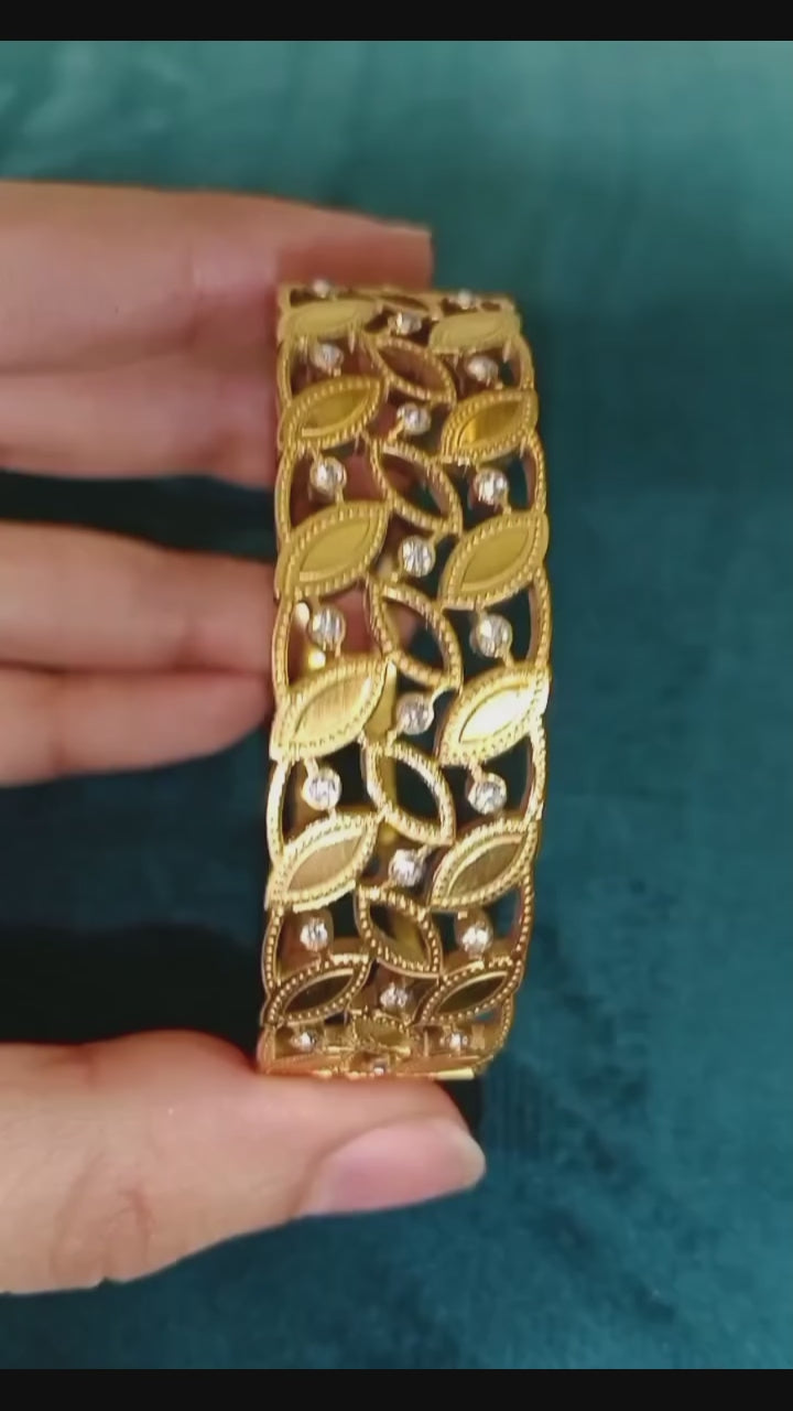 Elegant Gold-Tone Crystal Leaf Vine Bangle